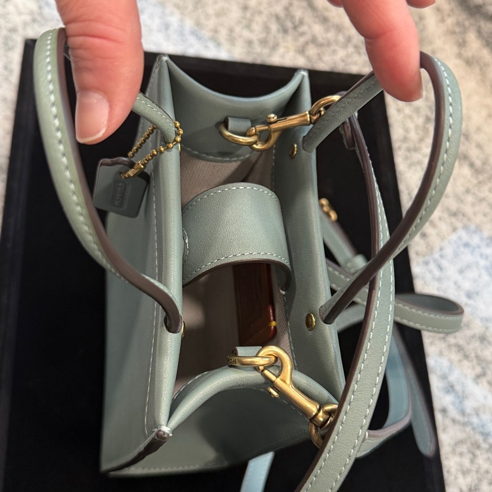 Coach Mini Teal Glovetanned
Leather Tote/Crossbody NWOT, never used - Picture 7 of 10